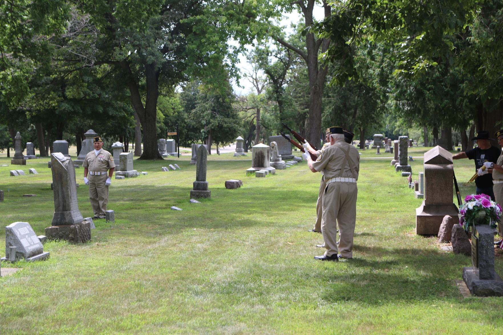 Mason City Veterans Honor Guard firing volleys